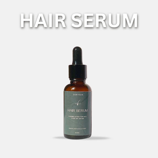 Hair serum bottle with dropper on a light gray background